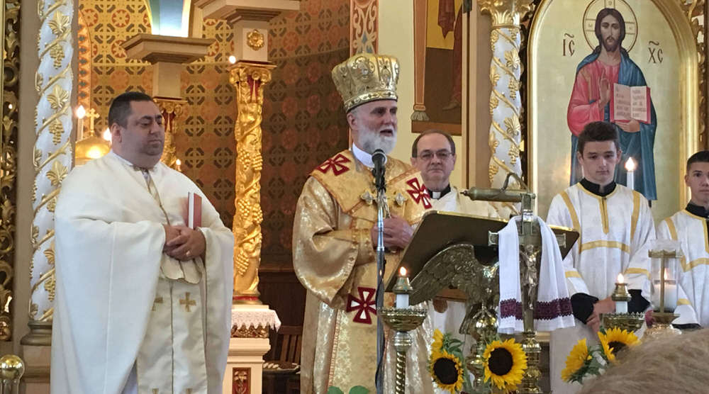 Bishop speaks during church service