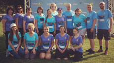 Group photo of staff at corporate challenge race