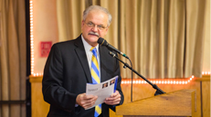 Male speaks at podium