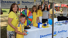 people standing in front of booth