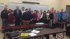 Group photo of participants in a financial education class
