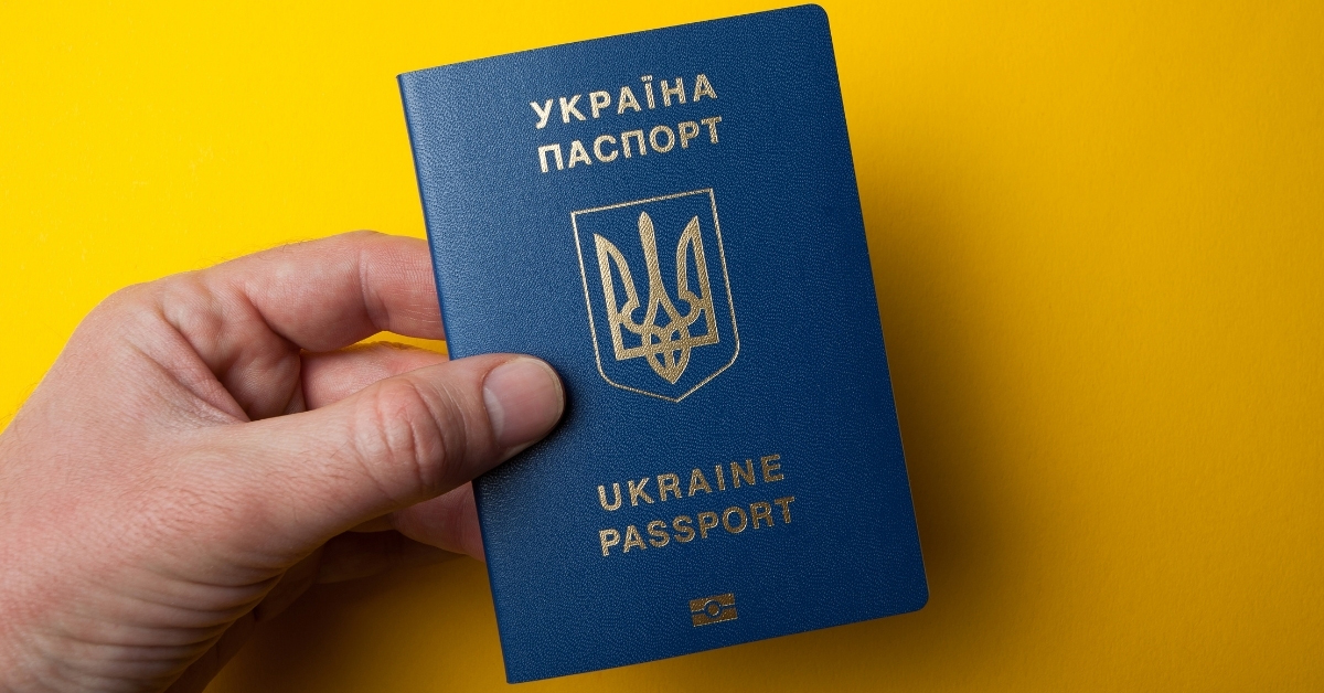 Ukrainian passport in hand