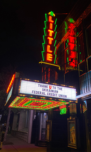 Illuminated sign at movie theater