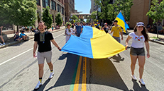 Young adults marching in parade